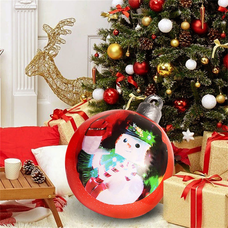 Giant inflatable Christmas bauble in garden