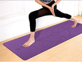 Non-slip yoga mat with alignment lines