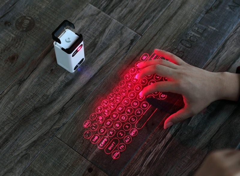 Laser projection keyboard on a desk