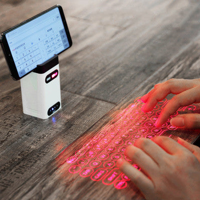 Laser projection keyboard on a desk