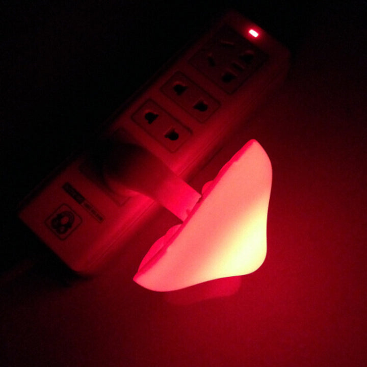 Glowing mushroom night light in wall