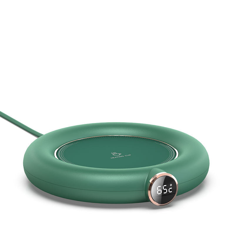Mug warmer pad with coffee cup on desk