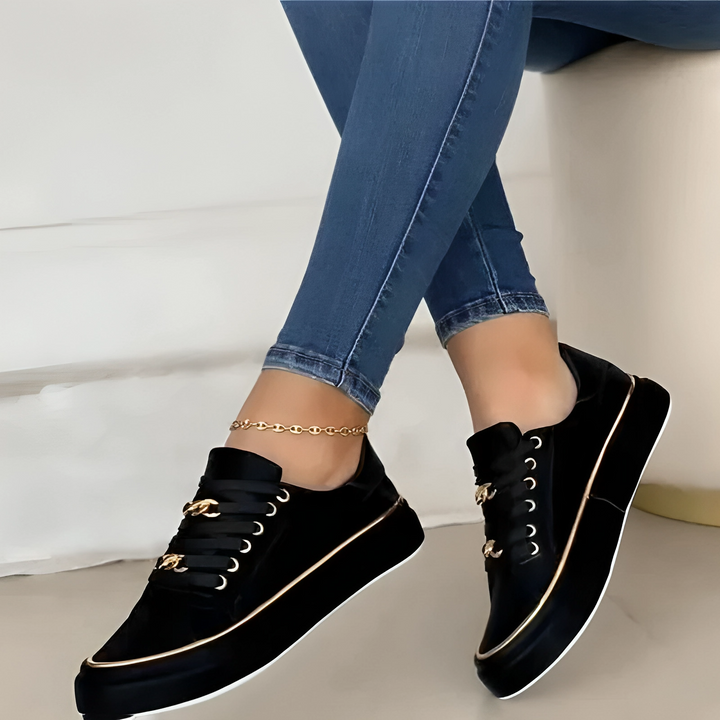 Trendy Black Low-Top Trainers with Gold Accents for All-Day Comfort and Durable PU Leather Construction