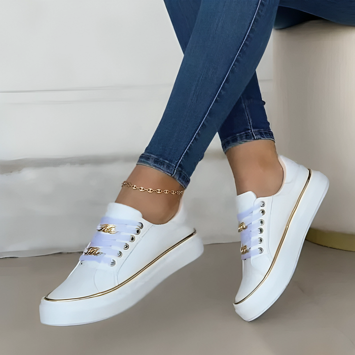 Trendy Black Low-Top Trainers with Gold Accents for All-Day Comfort and Durable PU Leather Construction