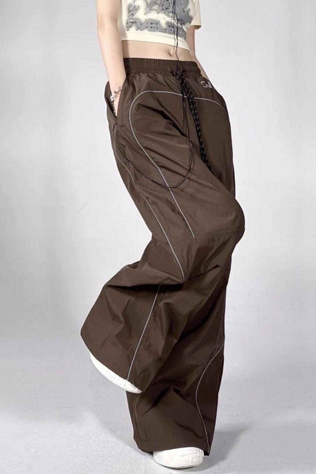 Brown Parachute Trousers with Adjustable Drawcord, Six-Pocket Design, Oversized Fit for Casual and Urban Wear