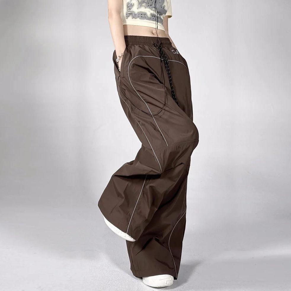Brown Parachute Trousers with Adjustable Drawcord, Six-Pocket Design, Oversized Fit for Casual and Urban Wear