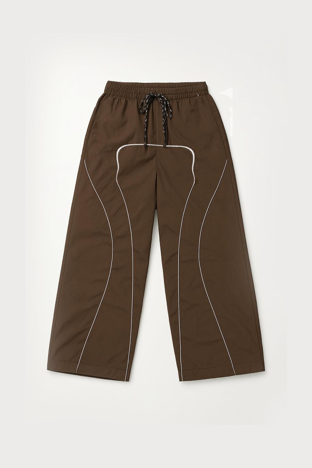 Brown Parachute Trousers with Adjustable Drawcord, Six-Pocket Design, Oversized Fit for Casual and Urban Wear