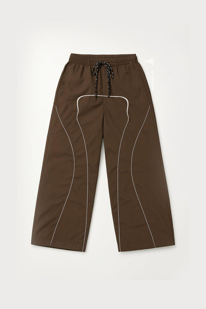 Brown Parachute Trousers with Adjustable Drawcord, Six-Pocket Design, Oversized Fit for Casual and Urban Wear