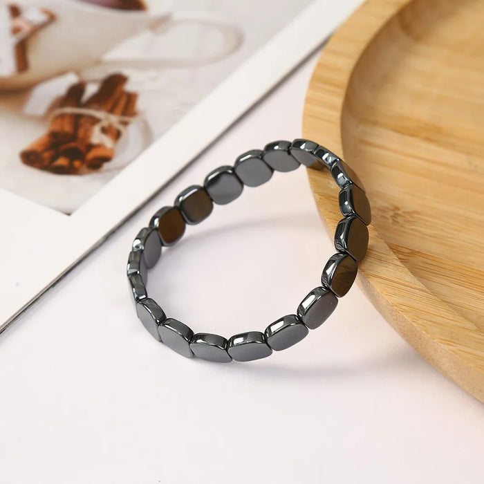 Supportive men's hematite bracelet – natural stone beaded stretch, geometric, gift jewellery