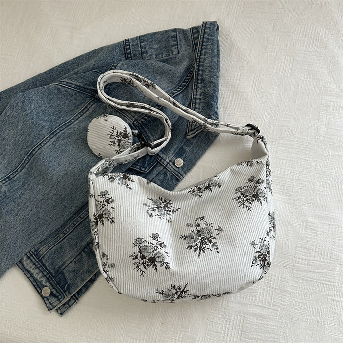 Soft women's messenger bag - dumpling bag with floral print, canvas, casual everyday use