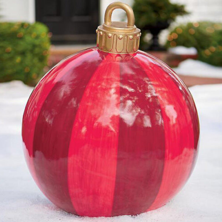 Giant inflatable Christmas bauble in garden