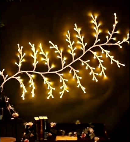 Willow vine LED lights over a mirror